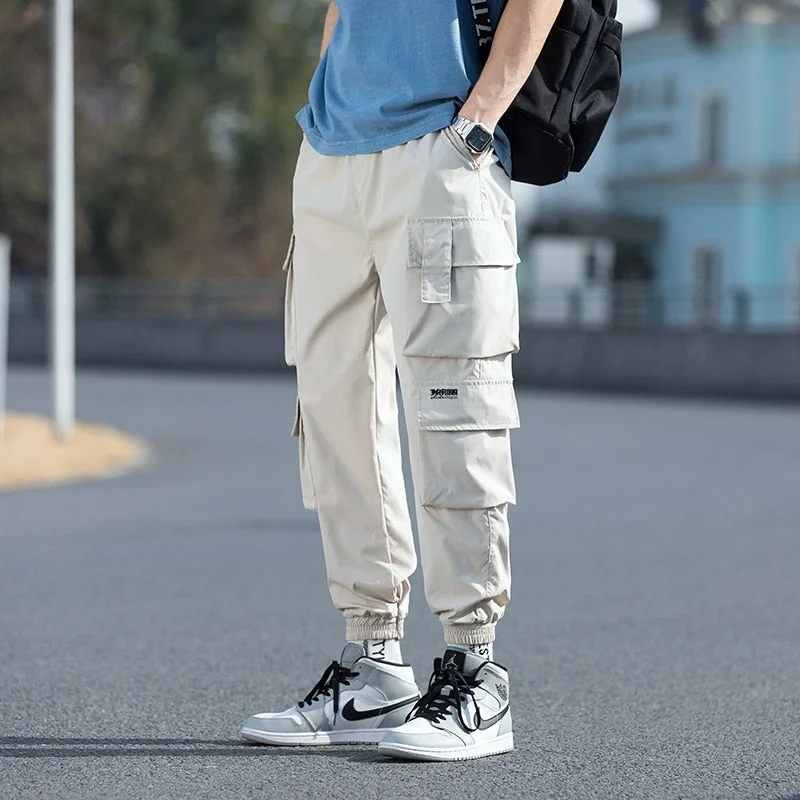 2021 Oversized Men Cargo Pants Streetwear Black Mens Jogging Sweatpants Casual Elastic Waist Harem Pants Male Large Size 5XL