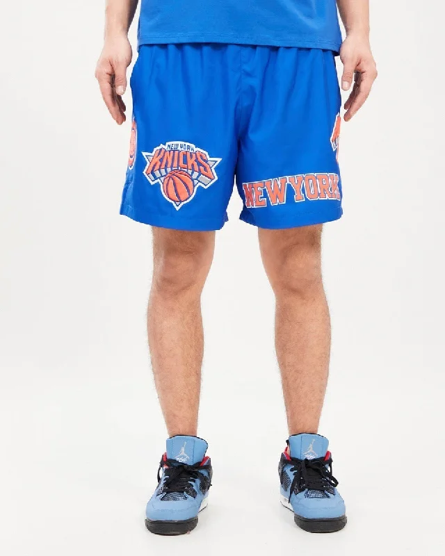 NBA NEW YORK KNICKS LOCK UP TEAM LOGO MEN'S WOVEN SHORT (ROYAL BLUE)